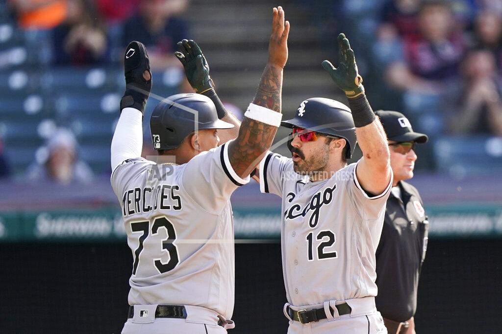 Tony Dejak Chicago White Sox's Adam Eaton (12) and Yermin Mercedes (73) celebrate after Eaton hit a two-run home run in the eighth inning of the first baseball game of a doubleheader against the Cleveland Indians, Monday, May 31, 2021, in Cleveland. (AP Photo/Tony Dejak)