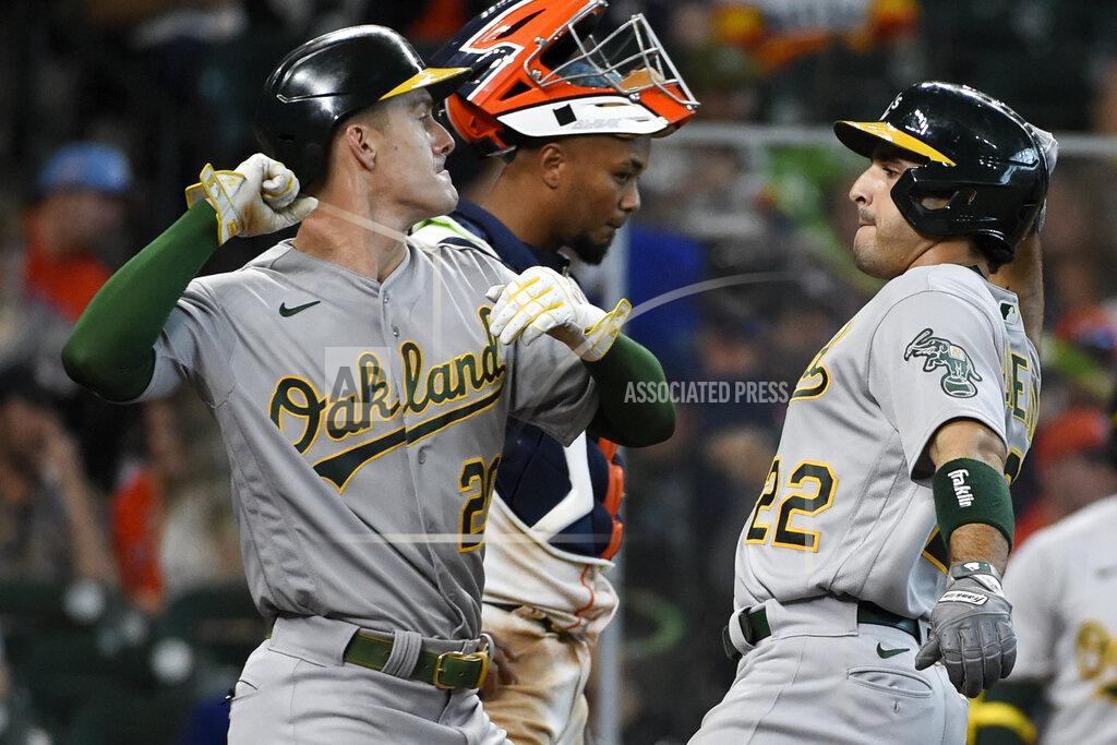 Eric Christian Smith Oakland Athletics' Ramon Laureano, right, celebrates his two-run home run with Mark Canha during the fifth inning of a baseball game against the Houston Astros, Saturday, April 10, 2021, in Houston. (AP Photo/Eric Christian Smith)