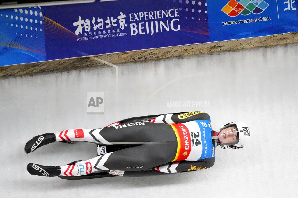 Mark Schiefelbein Madeleine Egle of Austria competes during the women's race at the Luge World Cup, a test event for the 2022 Winter Olympics, at the Yanqing National Sliding Center in Beijing, Sunday, Nov. 21, 2021. (AP Photo/Mark Schiefelbein)