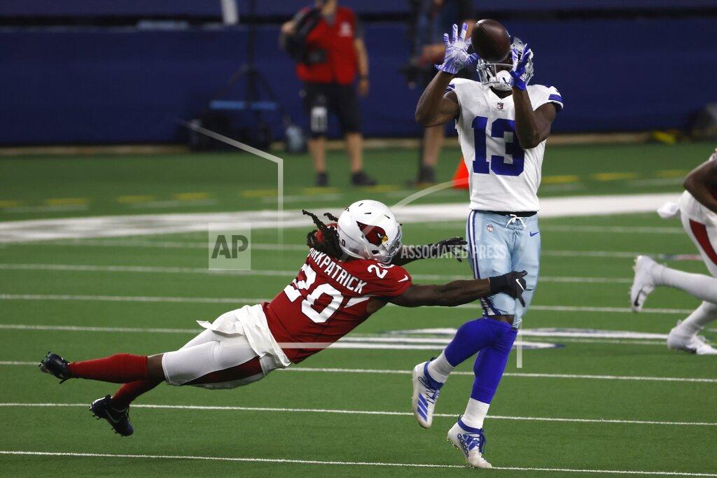 Ron Jenkins Arizona Cardinals cornerback Dre Kirkpatrick (20) defends as Dallas Cowboys wide receiver Michael Gallup (13) catches a pass in the first half of an NFL football game in Arlington, Texas, Monday, Oct. 19, 2020. (AP Photo/Ron Jenkins)