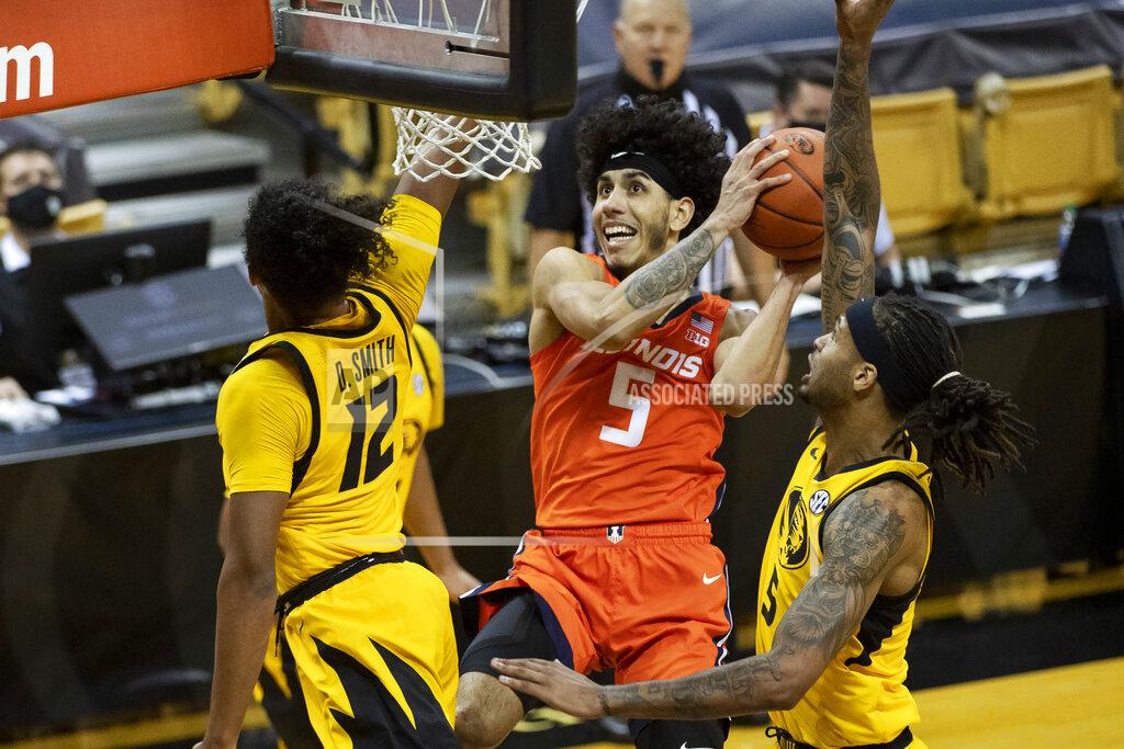 L.g. Patterson Illinois' Andre Curbelo, center, shoots between Missouri's Dru Smith, left, and Mitchell Smith, right, during the first half of an NCAA college basketball game Saturday, Dec. 12, 2020, in Columbia, Mo. (AP Photo/L.G. Patterson)