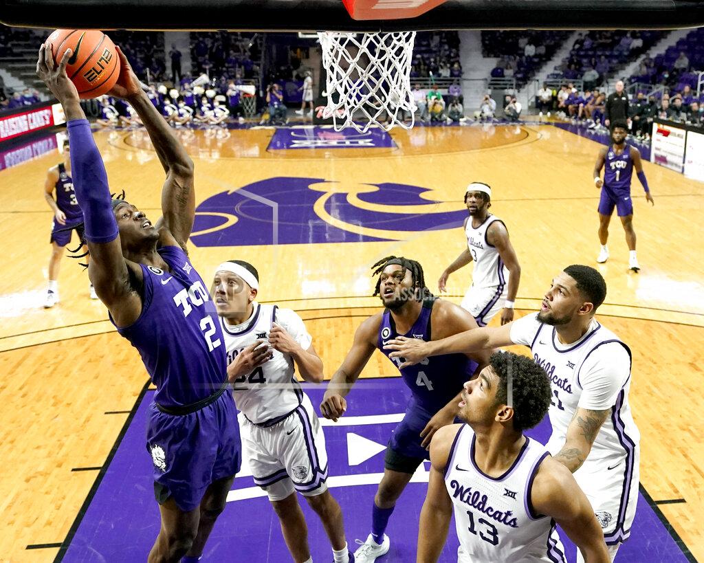 Charlie Riedel TCU forward Emanuel Miller (2) puts up a basket during the first half of an NCAA college basketball game against Kansas State Wednesday, Jan. 12, 2022, in Manhattan, Kan. (AP Photo/Charlie Riedel)