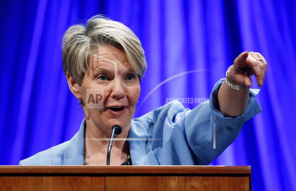 Robert F. Bukaty FILE - In this May 19, 2018 file photo, gubernatorial candidate Betsy Sweet speaks at the Democratic convention in Lewiston, Maine. Sweet is one of three Democrat candidates seeking the party's nomination for U.S. Senate in the July 14, 2020, primary. (AP Photo/Robert F. Bukaty, File)