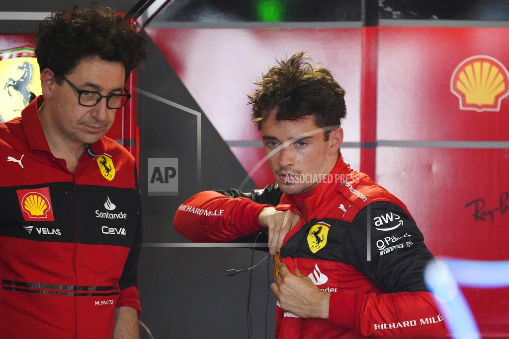 Darron Cummings Ferrari driver Charles Leclerc of Monaco speaks with Ferrari team principal Mattia Binotto following the first practice session for the Formula One Miami Grand Prix auto race at the Miami International Autodrome, Friday, May 6, 2022, in Miami Gardens, Fla. (AP Photo/Darron Cummings)