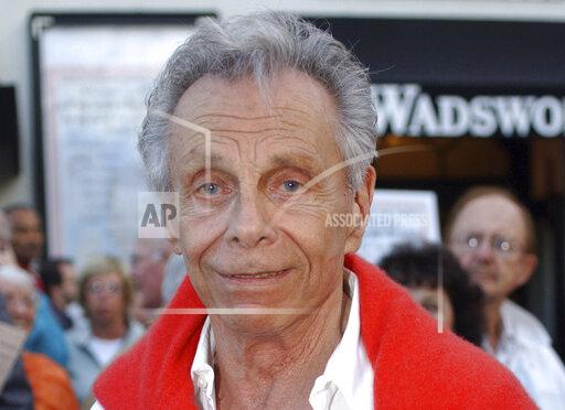 FILE - Comedian Mort Sahl poses for photographs at the 80th Birthday "Sahl-ute" honoring him, in Los Angeles on June 28, 2007. Sahl, who helped revolutionize stand-up comedy during the Cold War with his running commentary on politicians and current events died Tuesday, Oct. 26. 2021. He was 94. His friend Lucy Mercer said that he died "peacefully" at his home in Mill Valley, Calif. (AP Photo/Ann Johansson, File)