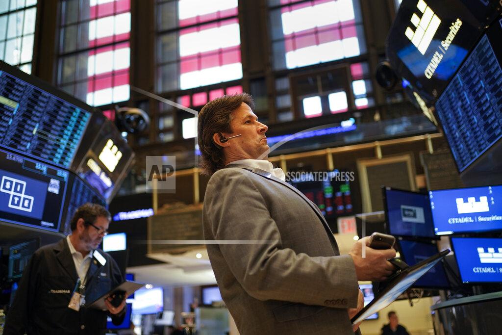 Seth Wenig Traders work on the floor at the New York Stock Exchange in New York, Friday, July 1, 2022. Stocks are off to a weak start on Friday, continuing a dismal streak that pushed Wall Street into a bear market last month as traders worry that inflation will be tough to beat and that a recession could be on the way as well. (AP Photo/Seth Wenig)