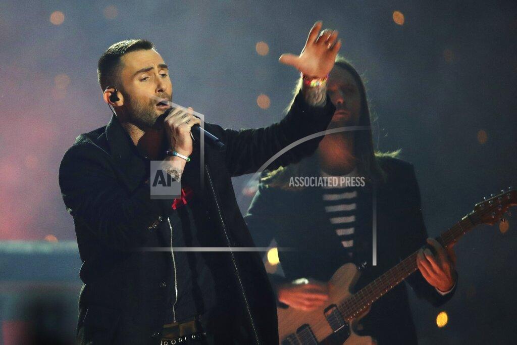 Matt Rourke FILE -Adam Levine of Maroon 5 performs during halftime of the NFL Super Bowl 53 football game between the Los Angeles Rams and the New England Patriots Sunday, Feb. 3, 2019, in Atlanta. Maroon 5 and Usher will headline a benefit concert in Atlanta to honor the legacy of the late U.S. Rep. John Lewis. The Grammy Award-winning pop band and singer will perform during the Beloved Benefit at the Mercedes-Benz Stadium on July 7, concert officials announced Thursday, May 5, 2022. (AP Photo/Matt Rourke, File)