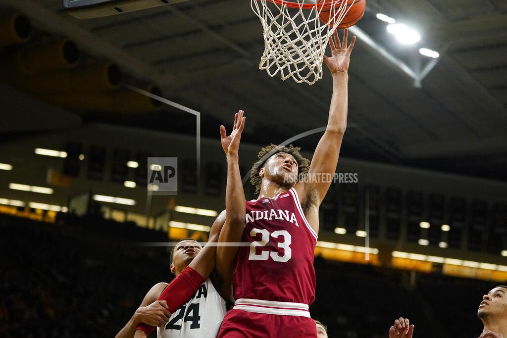 Charlie Neibergall Indiana forward Trayce Jackson-Davis (23) shoots over Iowa forward Kris Murray (24) during the first half of an NCAA college basketball game, Thursday, Jan. 13, 2022, in Iowa City, Iowa. (AP Photo/Charlie Neibergall)