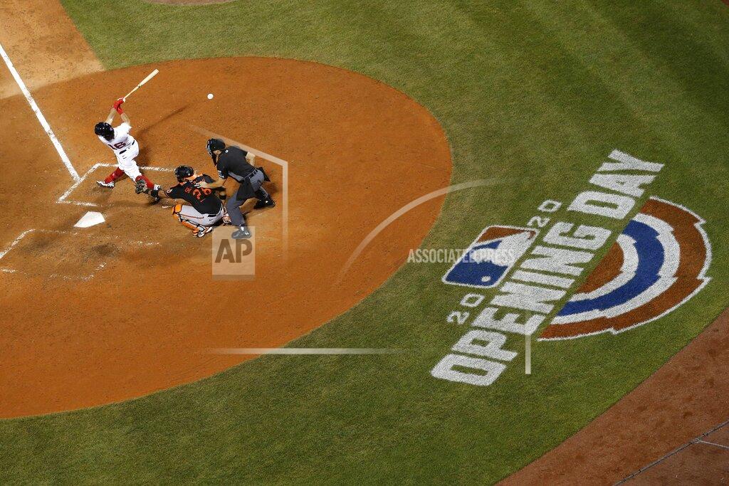 Michael Dwyer Boston Red Sox's Andrew Benintendi (16) fouls off in front of Baltimore Orioles' Pedro Severino during the fifth inning of an opening day baseball game at Fenway Park, Friday, July 24, 2020, in Boston. (AP Photo/Michael Dwyer)