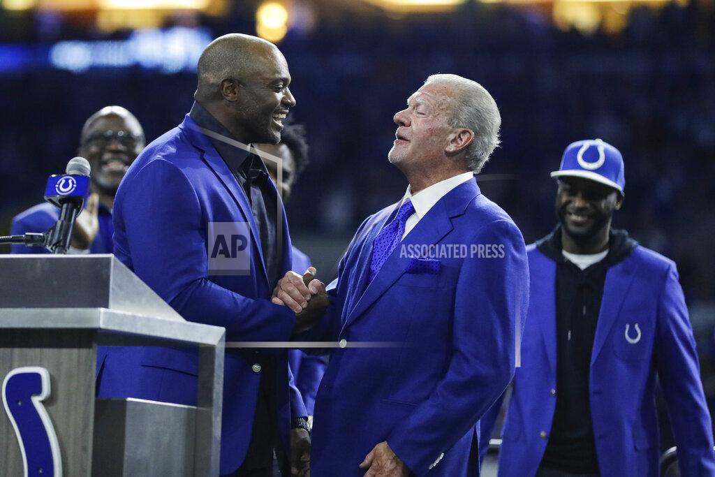 Darron Cummings Former Indianapolis Colts defensive end Dwight Freeney shakes hands with Colts owner Jim Irsay during his Ring of Honor induction ceremony during half time of an NFL football game against the Miami Dolphins in Indianapolis, Sunday, Nov. 10, 2019. (AP Photo/Darron Cummings)