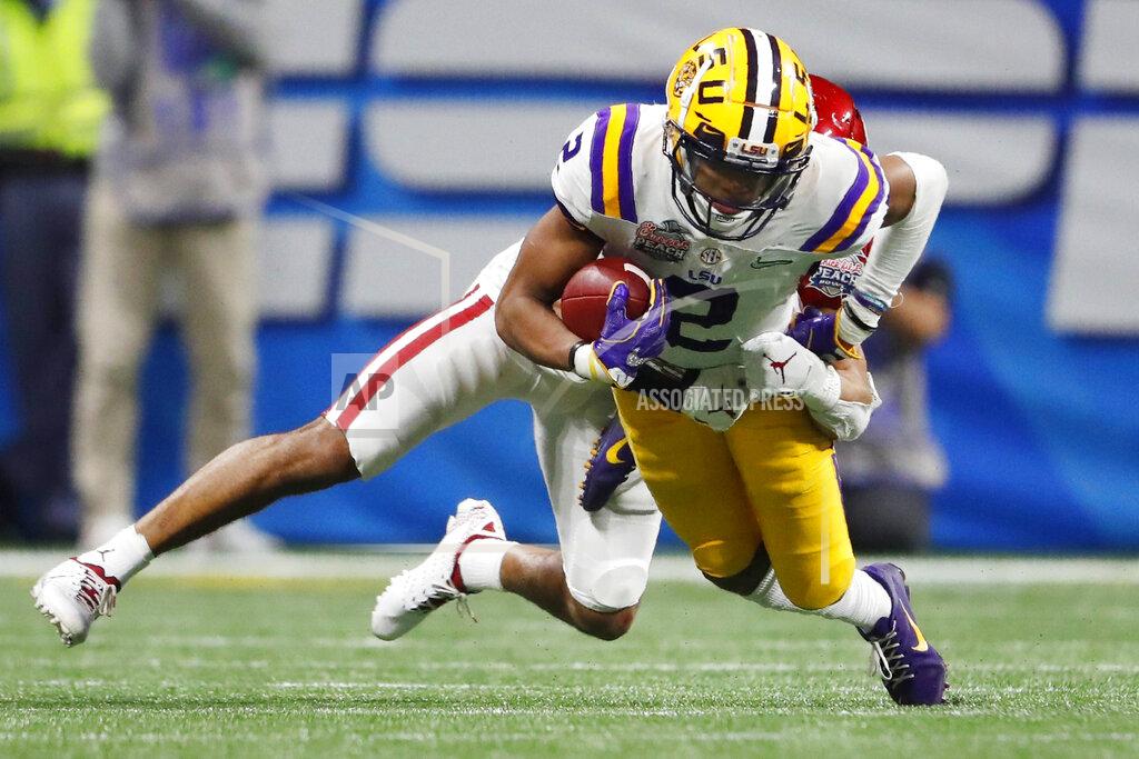 John Bazemore LSU wide receiver Justin Jefferson (2) runs against Oklahoma cornerback Woodi Washington (5) during the second half of the Peach Bowl NCAA semifinal college football playoff game, Saturday, Dec. 28, 2019, in Atlanta. LSU won 63-28. (AP Photo/John Bazemore)