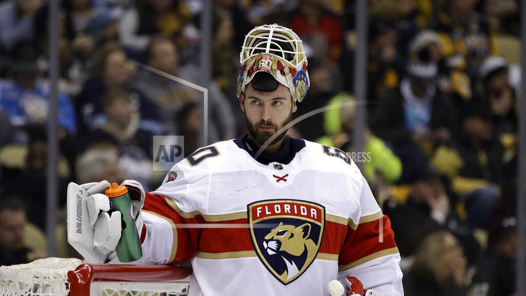 Gene J. Puskar FILE - Florida Panthers goaltender Chris Driedger takes a timeout during the second period of an NHL hockey game against the Pittsburgh Penguins in Pittsburgh, in this Sunday, Jan. 5, 2020, file photo. Adam Larsson and Chris Driedger are going to the Seattle Kraken in the expansion draft. One person with knowledge of Larsson’s deal said the defenseman has agreed to terms with Seattle on a $16 million, four-year contract. Another person with knowledge of Driedger’s deal said the goaltender has agreed to a $10.5 million, three-year contract. The people spoke to The Associated Press on condition of anonymity Wednesday morning because the team was not announcing any moves until the expansion draft Wednesday night, July 21, 2021. (AP Photo/Gene J. Puskar, File)