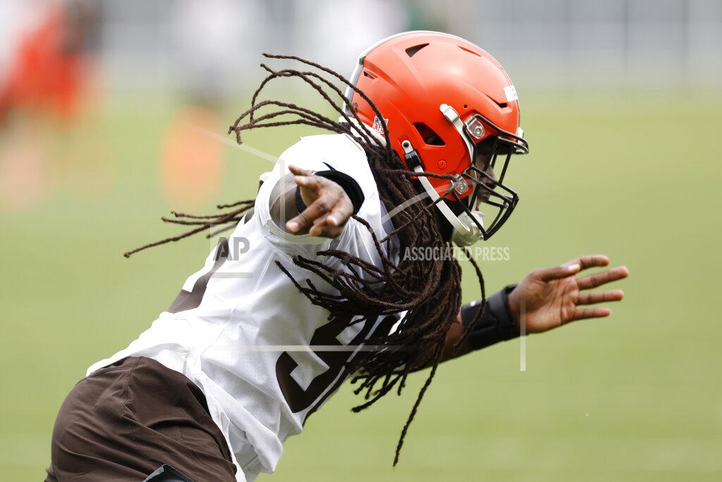 Ron Schwane Cleveland Browns's Jadeveon Clowney runs through a drill during an NFL football practice at the team's training facility Wednesday, May 25, 2022, in Berea, Ohio. (AP Photo/Ron Schwane)