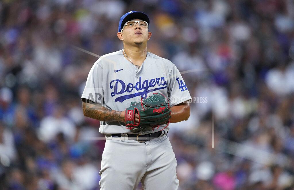 David Zalubowski Los Angeles Dodgers starting pitcher Julio Urias reacts after givng up an RBI double to Colorado Rockies' Brendan Rodgers during the fourth inning of a baseball game Wednesday, June 29, 2022, in Denver. (AP Photo/David Zalubowski)