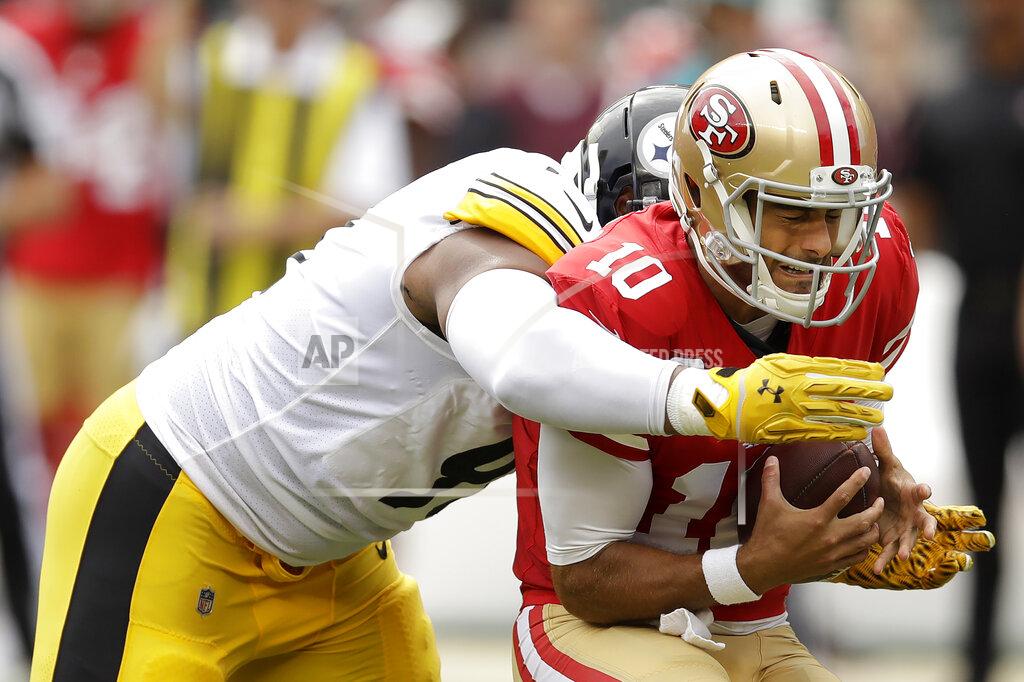 Ben Margot Pittsburgh Steelers defensive end Stephon Tuitt, left, sacks San Francisco 49ers quarterback Jimmy Garoppolo during the first half of an NFL football game in Santa Clara, Calif., Sunday, Sept. 22, 2019. (AP Photo/Ben Margot)