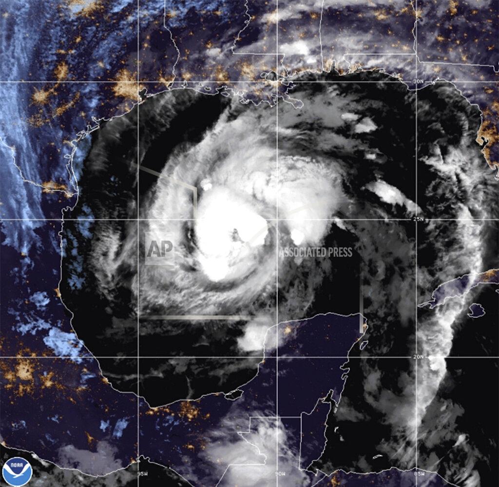 Uncredited This satellite image provided by the National Oceanic and Atmospheric Administration shows Tropical Storm Zeta, Wednesday, Oct. 28, 2020, at 10:52 GMT (06:52 EDT). (NOAA/NESDIS/STAR via AP)