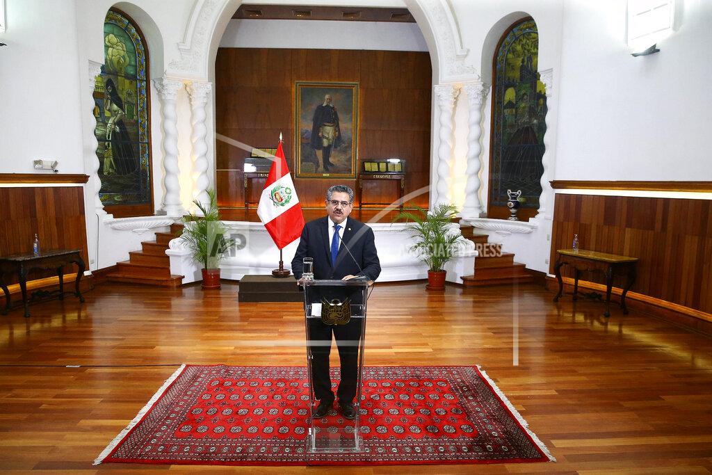 Luis Iparraguirre In this photo released by Peru's Presidential Palace, Peru's interim president Manuel Merino announces his resignation via a televised address from the Presidential Palace in Lima, Peru, Sunday, Nov. 15, 2020. Merino stepped down following massive protests unleashed when Congress ousted President Martin Vizcarra. (Luis Iparraguirre/Peru's Presidential Palace via AP)