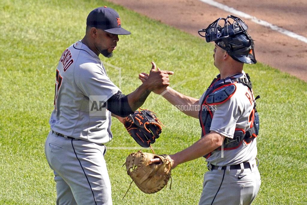 Nam Y. Huh Detroit Tigers relief pitcher Jose Cisnero, left, celebrates with catcher Jake Rogers after the Tigers defeated the Chicago White Sox 4-3 in a baseball game in Chicago, Saturday, June 5, 2021. (AP Photo/Nam Y. Huh)