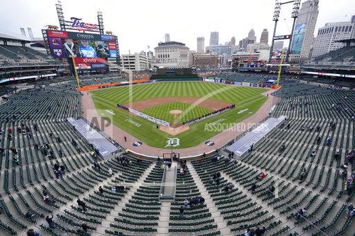 Carlos Osorio Baseball fans watch the opening ceremony of the Detroit Tigers and Cleveland Indians baseball game at Comerica Park, Thursday, April 1, 2021, in Detroit. (AP Photo/Carlos Osorio)