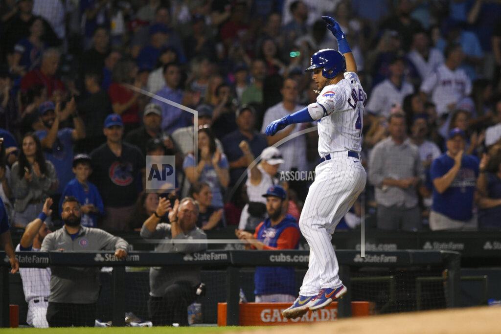 Paul Beaty Chicago Cubs' Willson Contreras celebrates while rounding third base after hitting a two-run home run during the fifth inning of the team's baseball game against the Cincinnati Reds on Wednesday, June 29, 2022, in Chicago. (AP Photo/Paul Beaty)