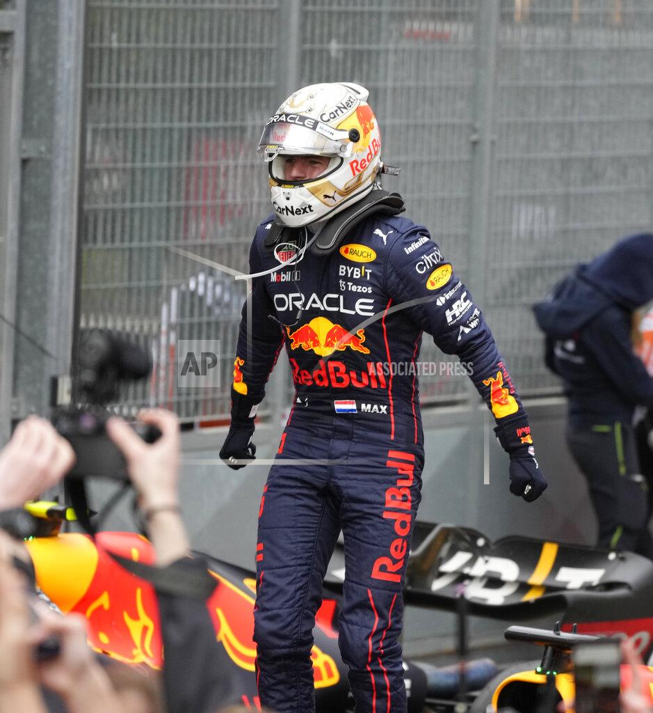Luca Bruno Red Bull driver Max Verstappen of the Netherlands celebrates after winning the Emilia Romagna Formula One Grand Prix, at the Enzo and Dino Ferrari racetrack, in Imola, Italy, Sunday, April 24, 2022. (AP Photo/Luca Bruno)