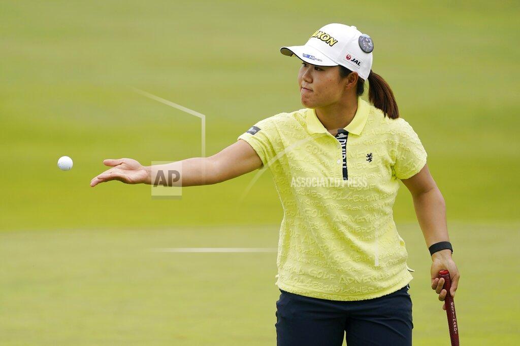 John Minchillo Nasa Hataoka tosses a ball to her caddie on the first green during the third round of the LPGA Cognizant Founders Cup golf tournament, Saturday, May 14, 2022, at the Upper Montclair Country Club in Clifton, N.J. (AP Photo/John Minchillo)