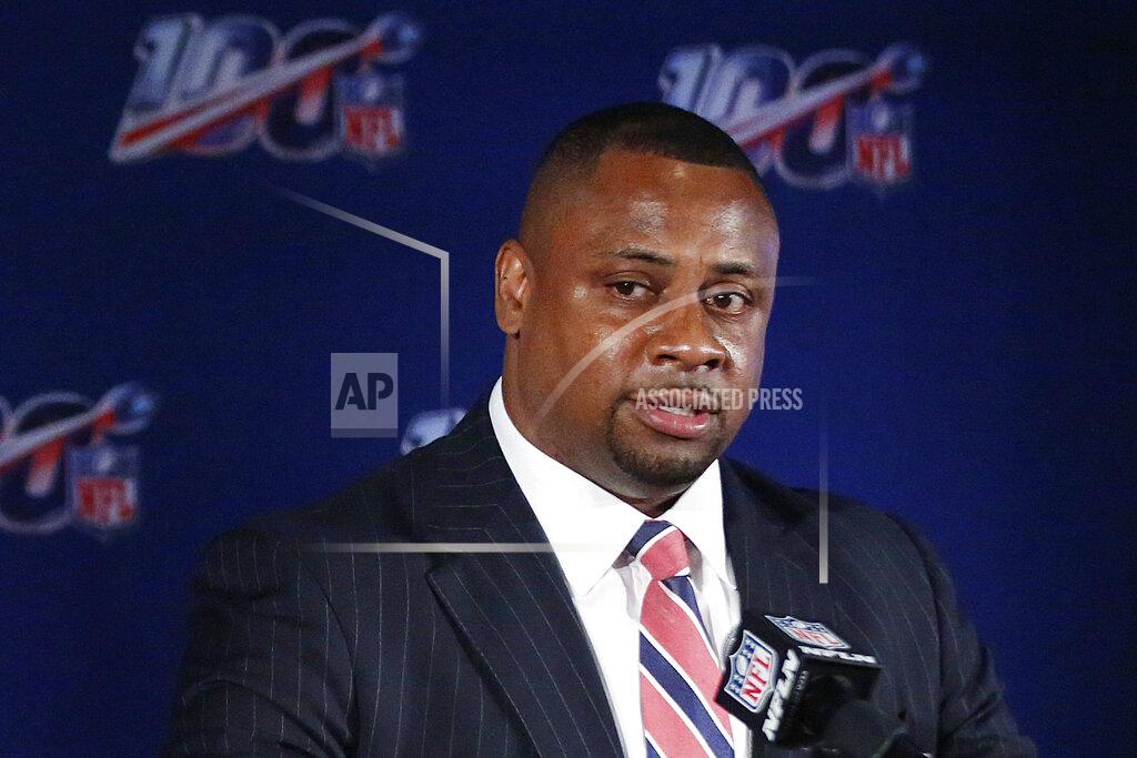 FILE - In this May 22, 2019, file photo, Troy Vincent, NFL executive vice president, speaks to the media during the owners meetings in Key Biscayne, Fla. The NFL is planning to play a full season though it’s uncertain what that will look like. "The schedule will come out as normal, but we’re doing reasonable and responsible planning as we always do, inside of game operations,” league executive Troy Vincent told The Associated Press on Thursday, April 30, 2020. (AP Photo/Brynn Anderson, File)