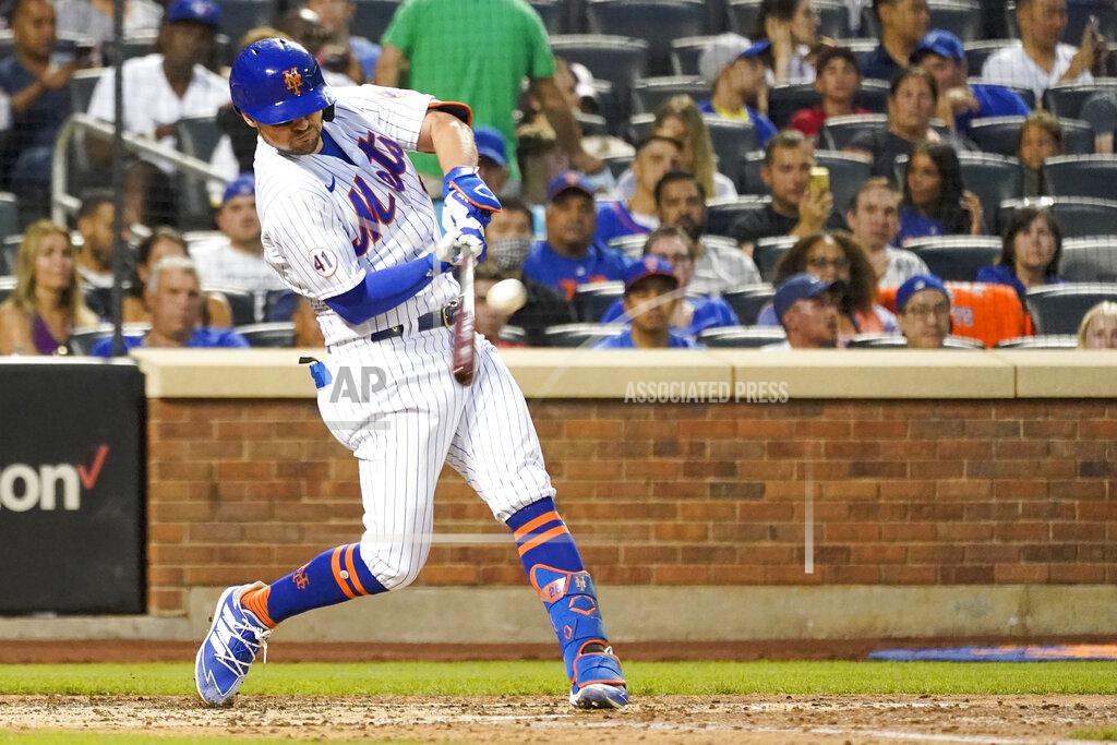 Mary Altaffer New York Mets' J.D. Davis hits a single during the fourth inning of the team's baseball game against the Toronto Blue Jays, Saturday, July 24, 2021, in New York. (AP Photo/Mary Altaffer)