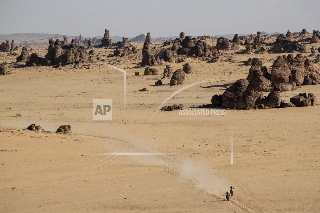 Bernat Armangue Two motorbikes race during stage four of the Dakar Rally between Neom and Al Ula, in Saudi Arabia, Wednesday, Jan. 8, 2020. (AP Photo/Bernat Armangue)