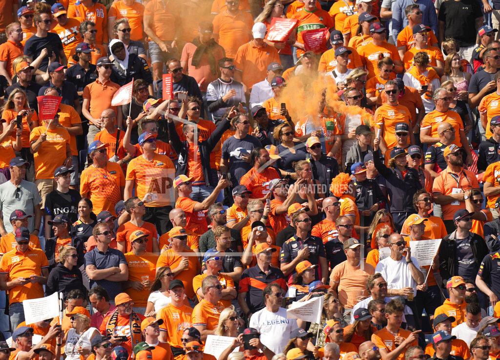 Peter Dejong Fans cheer during the drivers parade before the Formula One Dutch Grand Prix, at the Zandvoort racetrack, Netherlands, Sunday, Sept. 5, 2021. (AP Photo/Peter Dejong)