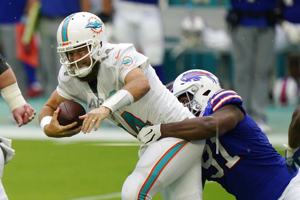 Wilfredo Lee Buffalo Bills defensive tackle Ed Oliver (91) sacks Miami Dolphins quarterback Ryan Fitzpatrick (14)during the first half of an NFL football game, Sunday, Sept. 20, 2020 in Miami Gardens, Fla. (AP Photo/Wilfredo Lee)
