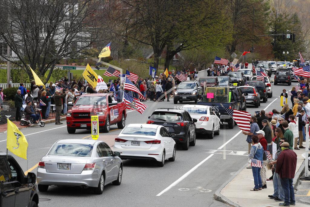 Robert F. Bukaty Protesters rally against the executive orders by Maine Gov. Janet Mills keep some of Maine businesses closed to help prevent the spread of coronavirus, Saturday, May 16, 2020, in Augusta, Maine. (AP Photo/Robert F. Bukaty)