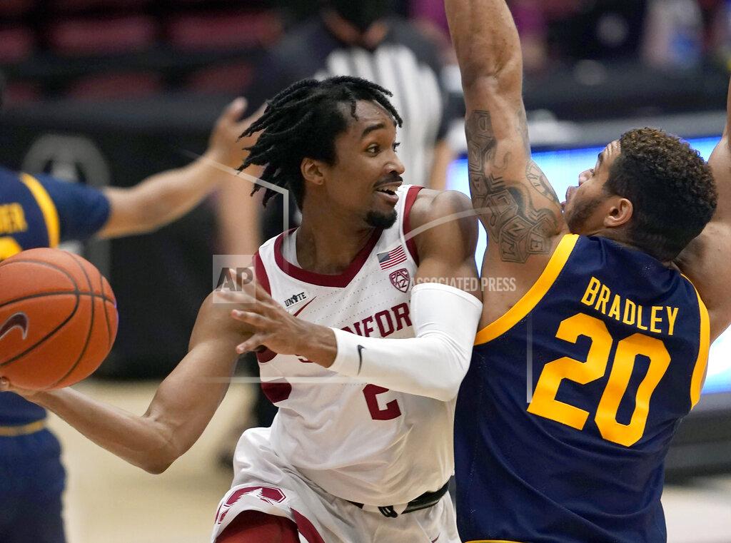 Tony Avelar Stanford guard Bryce Wills (2) looks to pass the ball against California guard Matt Bradley (20) during the first half of an NCAA college basketball game in Stanford, Calif., Sunday, Feb. 7, 2021. (AP Photo/Tony Avelar)