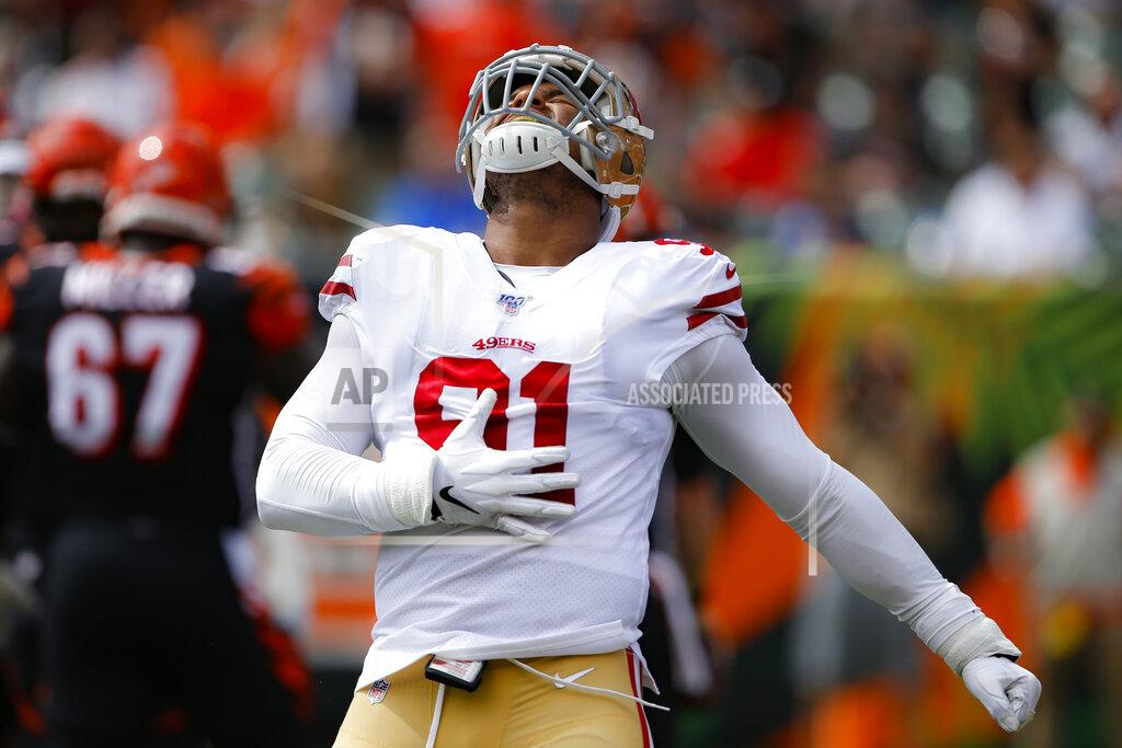 Gary Landers San Francisco 49ers defensive end Arik Armstead (91) reacts after sacking Cincinnati Bengals quarterback Andy Dalton during the first half an NFL football game, Sunday, Sept. 15, 2019, in Cincinnati. (AP Photo/Gary Landers)