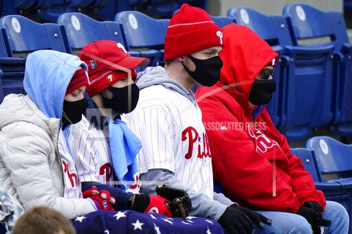 Matt Slocum Philadelphia Phillies' fans bundle up to watch an opening day baseball game against the Atlanta Braves, Thursday, April 1, 2021, in Philadelphia. (AP Photo/Matt Slocum)