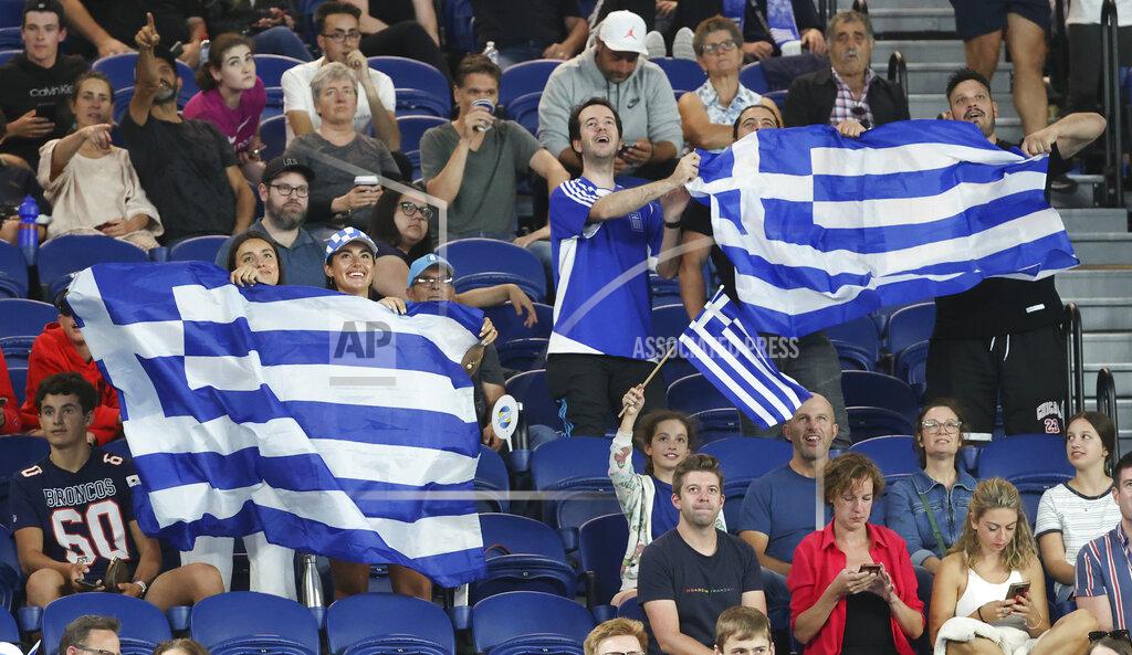 Hamish Blair Greek fans cheer on Greece's Stefanos Tsitsipas during his ATP Cup match against Australia's Alex de Minaur in Melbourne, Australia, Wednesday, Feb. 3, 2021. (AP Photo/Hamish Blair)