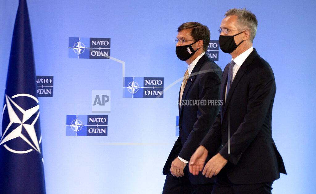 Virginia Mayo NATO Secretary General Jens Stoltenberg, right, walks with U.S. Secretary of Defense Mark Esper prior to a press conference at NATO headquarters in Brussels, Friday, June 26, 2020. U.S. Secretary of Defense Mark Esper is at NATO to follow-up on a broad range of issues raised during last week's NATO defense ministerial. (AP Photo/Virginia Mayo, Pool)