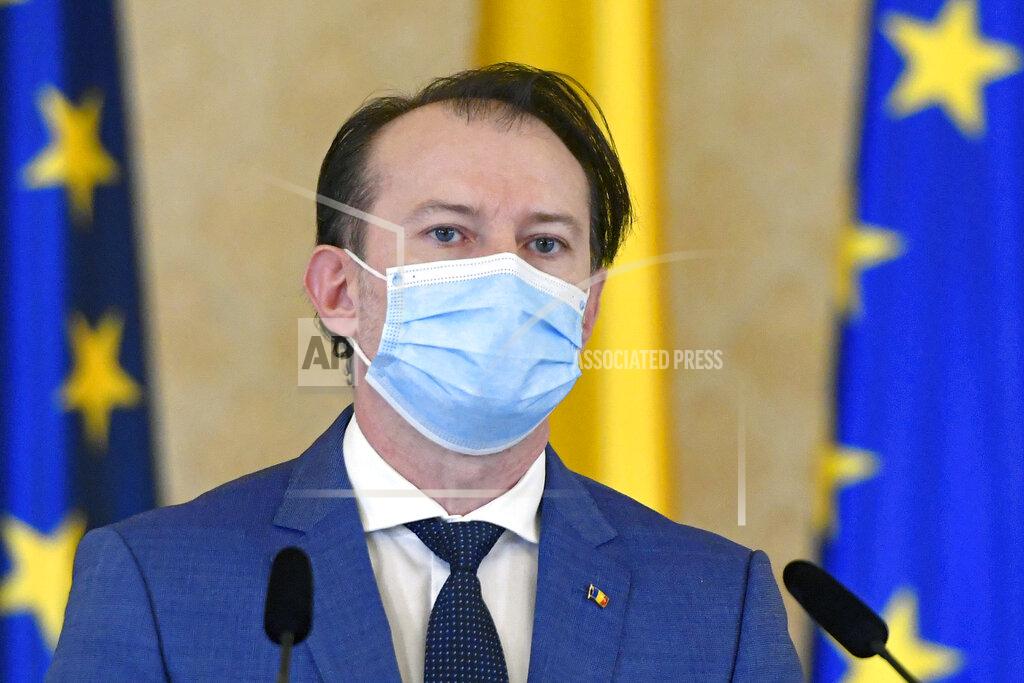 Andreea Alexandru Romanian prime minister-designate Florin Citu speaks after his nomination in Bucharest, Romania, Tuesday, Dec. 22, 2020. Romania's president on Tuesday appointed the outgoing finance minister as prime minister-designate after three pro-Western center-right groups joined forces to keep out of power a left-leaning populist party that won most votes at a parliamentary election earlier this month. (AP Photo/Andreea Alexandru)