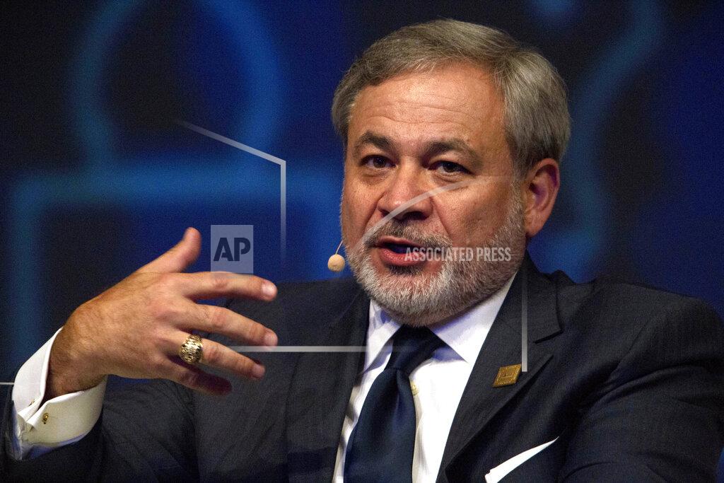 FILE - In this Sept. 9, 2019, file photo, now Energy Secretary Dan Brouillette is interviewed on stage at the World Energy Congress in Abu Dhabi, United Arab Emirates. The Trump administration on Thursday, April 23, 2020, urged government intervention to rescue U.S. uranium mining and nuclear fuel industries in a tough global marketplace, from making it easier to mine public lands out West to blocking some imports of foreign nuclear fuel. Brouillette said the United States risked losing position in the industry globally, costing it leverage when it comes to encouraging safe nuclear use around the world. (AP Photo/Jon Gambrell, File)