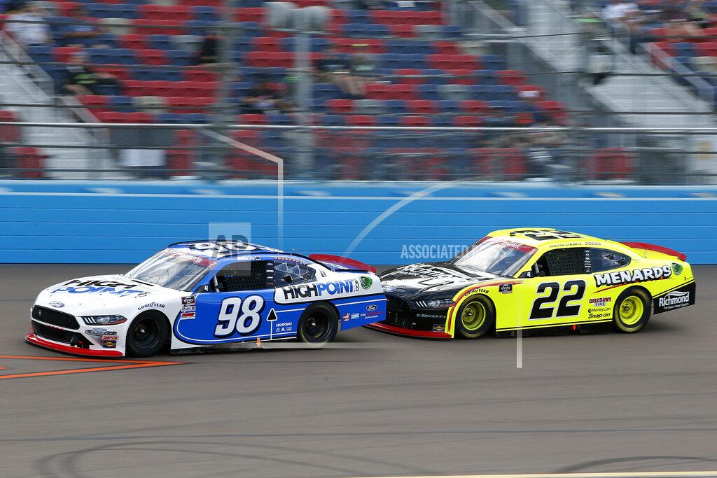 Ralph Freso Chase Briscoe (98) and Austin Cindric (22) race through Turn 4 during the NASCAR Xfinity Series auto race at Phoenix Raceway, Saturday, Nov. 7, 2020, in Avondale, Ariz. (AP Photo/Ralph Freso)