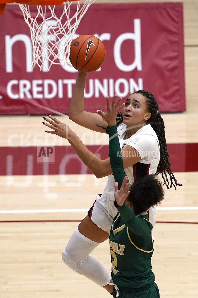 Tony Avelar Stanford guard Haley Jones drives to the basket against Cal Poly guard Chantel Govan (2) during the first half of an NCAA college basketball game in Stanford, Calif., Wednesday, Nov. 25, 2020. (AP Photo/Tony Avelar)