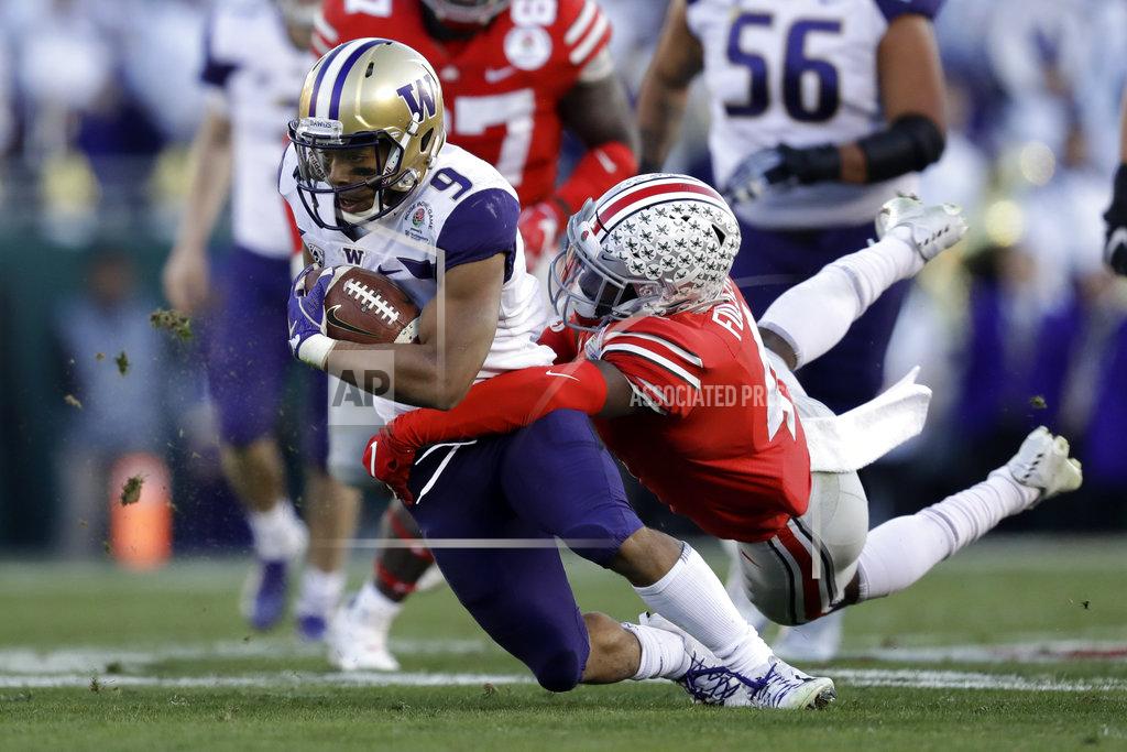 Marcio Jose Sanchez Washington running back Myles Gaskin is tackled by Ohio State safety Jordan Fuller during the second half of the Rose Bowl NCAA college football game Tuesday, Jan. 1, 2019, in Pasadena, Calif. (AP Photo/Marcio Jose Sanchez)