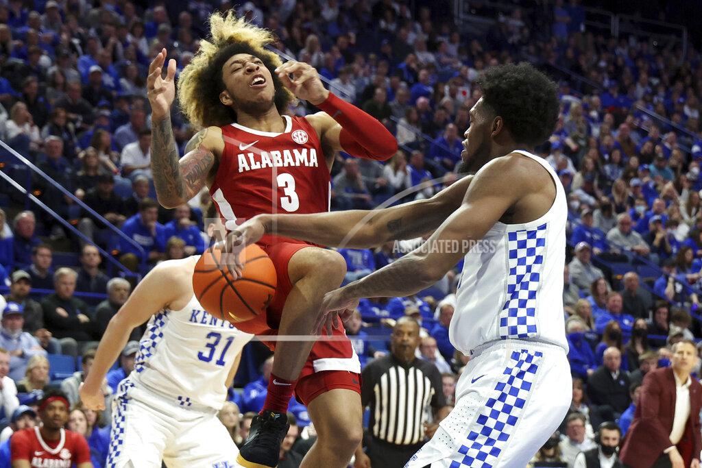 James Crisp Alabama's JD Davison (3) has the ball stripped by Kentucky's Keion Brooks Jr., right, during the second half of an NCAA college basketball game in Lexington, Ky., Saturday, Feb. 19, 2022. Kentucky won 90-81. (AP Photo/James Crisp)