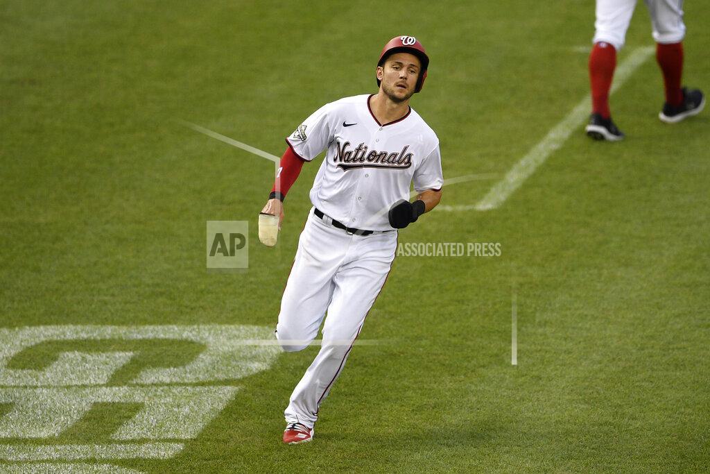 Nick Wass Washington Nationals'Trea Turner runs towards home to score on a single by Adam Eaton during the third inning of a baseball game against the Toronto Blue Jays, Tuesday, July 28, 2020, in Washington. (AP Photo/Nick Wass)