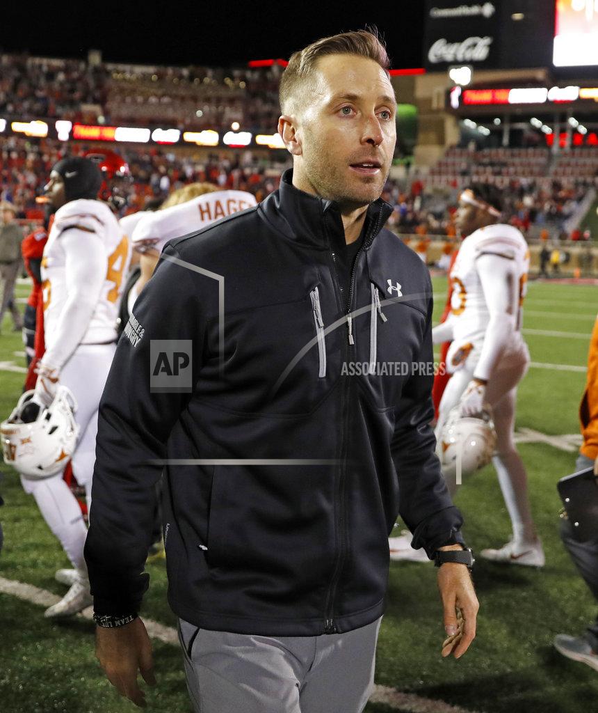 FILE - In this Nov. 10, 2018 file photo Texas Tech coach Kliff Kingsbury walks off the field after the team's NCAA college football game against Texas in Lubbock, Texas. The Arizona Cardinals have hired Kingsbury, a move aimed at providing guidance for young quarterback Josh Rosen and resuscitating the worst offense in the NFL. The Cardinals announced the hiring Tuesday, Jan. 8, 2018 after a long interview earlier in the day. (AP Photo/Brad Tollefson, file)