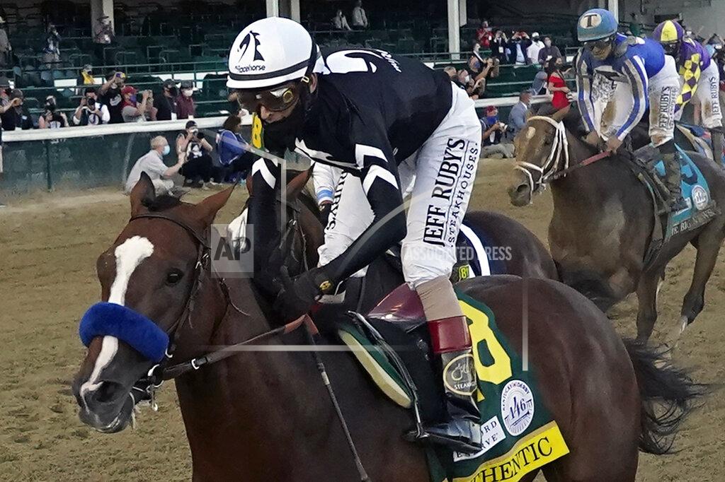 Jeff Roberson FILE - Jockey John Velazquez rides Authentic to win the 146th running of the Kentucky Derby at Churchill Downs, Saturday, Sept. 5, 2020, in Louisville, Ky. Belmont Stakes winner Tiz the Law won’t run in next month’s Preakness, spoiling what would have been a highly anticipated rematch with Kentucky Derby winner Authentic. The Preakness on Oct. 3 at Pimlico concludes this year’s reconfigured Triple Crown series, which was run out of order because of the coronavirus pandemic. (AP Photo/Jeff Roberson, File)