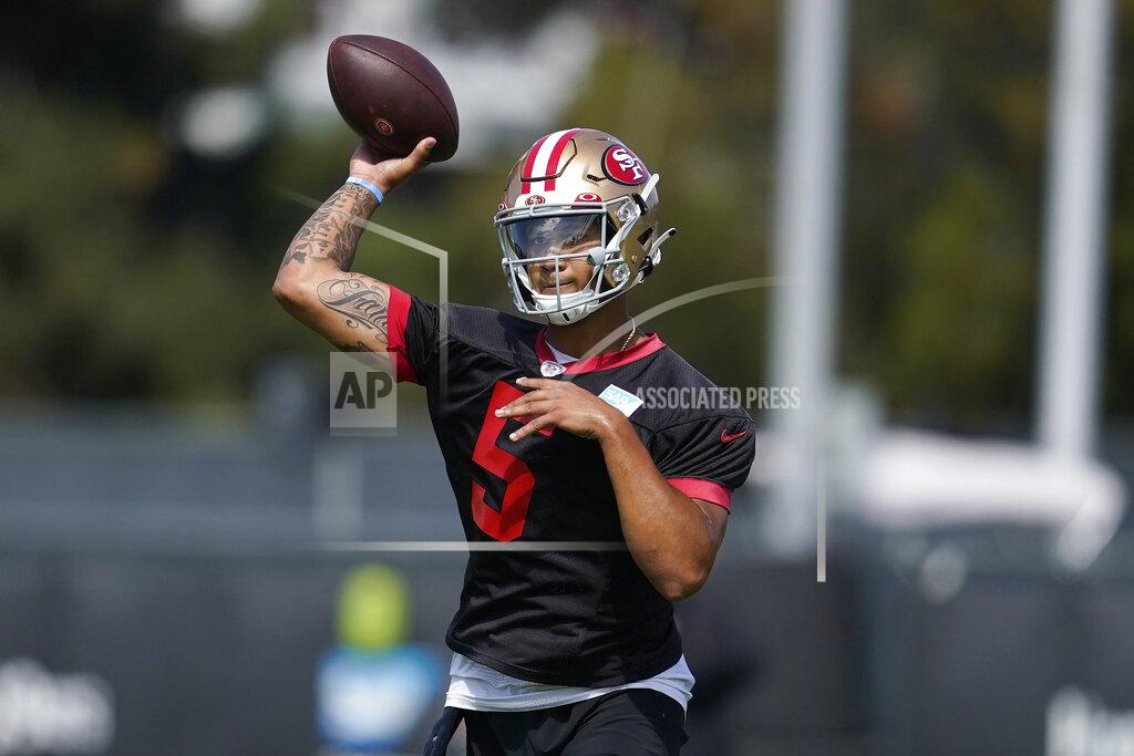 Jeff Chiu San Francisco 49ers quarterback Trey Lance throws a pass at NFL football training camp in Santa Clara, Calif., Wednesday, July 28, 2021. (AP Photo/Jeff Chiu)