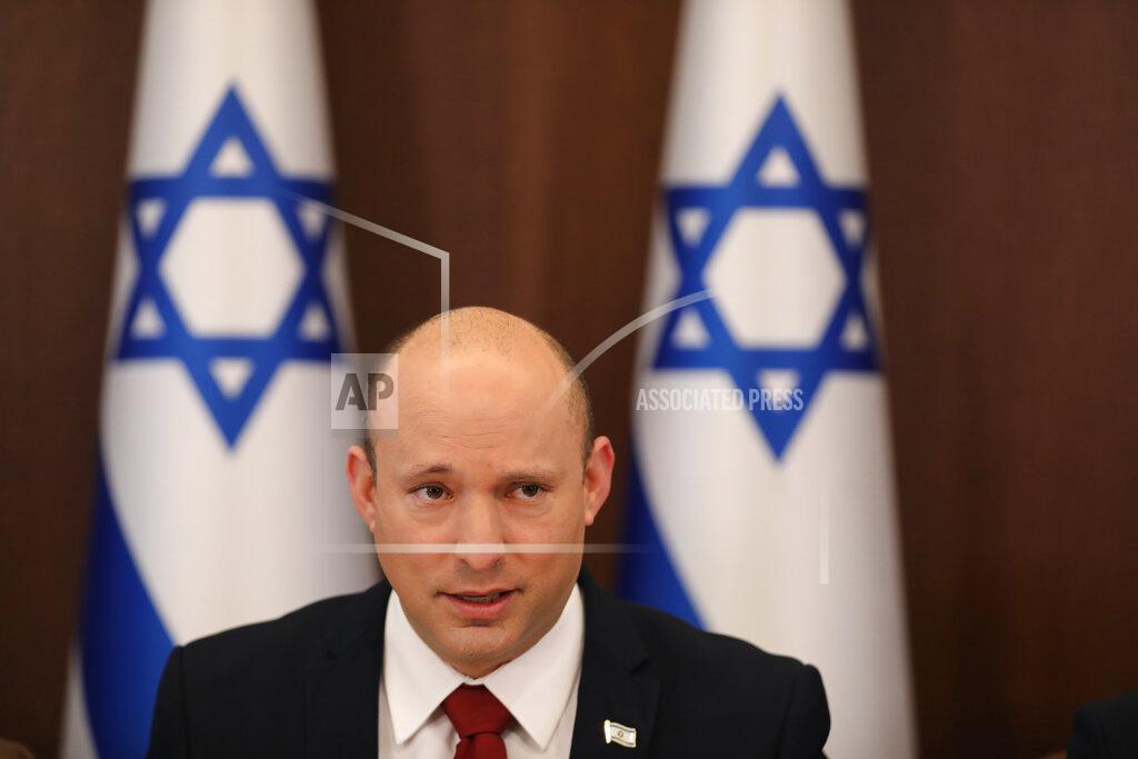 Abir Sultan Israeli Prime Minister Naftali Bennett attends a cabinet meeting at the prime minister's office in Jerusalem, Sunday, August 1, 2021. (Abir Sultan/Pool Photo via AP)
