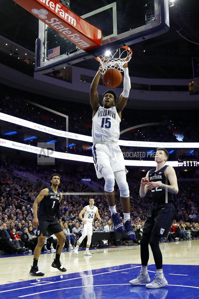 Matt Slocum Villanova's Saddiq Bey (15) dunks the ball as Butler's Jordan Tucker (1) and Sean McDermott (22) look on during the first half of an NCAA college basketball game, Saturday, March 2, 2019, in Philadelphia. (AP Photo/Matt Slocum)