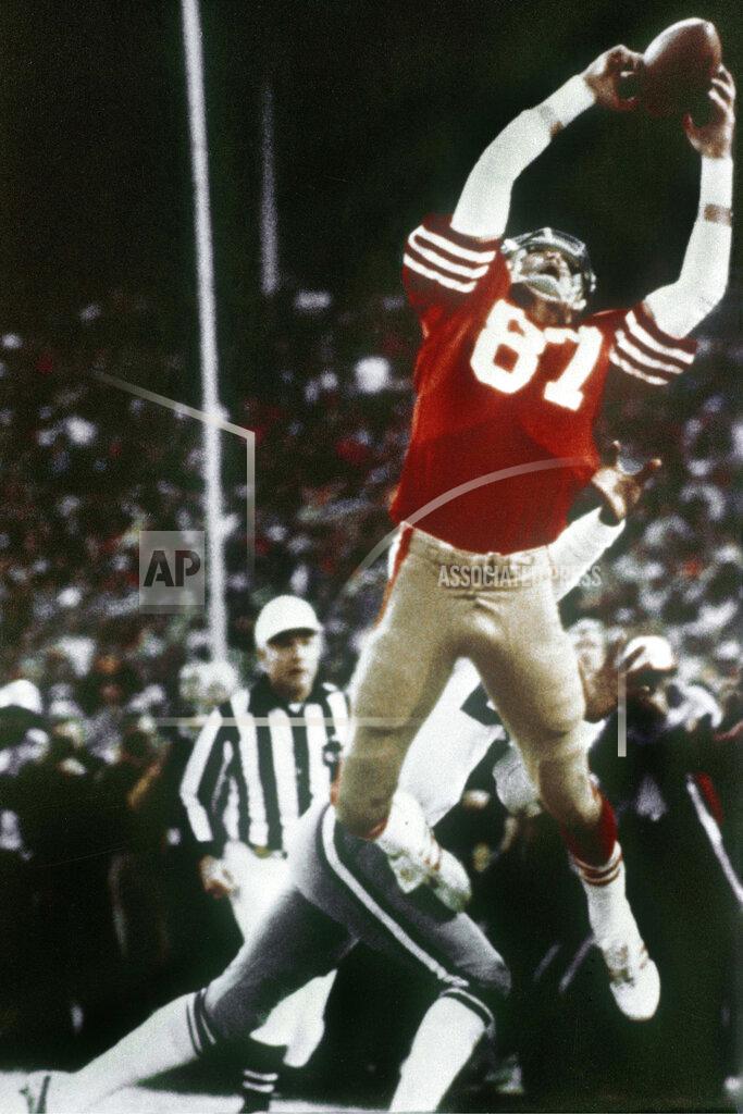 Phil Huber FILE - In this Jan. 10, 1982, file photo, San Francisco 49ers wide receiver Dwight Clark makes "The Catch," on a pass from Joe Montana that tied the game late in the fourth quarter against the Dallas Cowboys in the NFC championship football game at Candlestick Park in San Francisco. With “The Catch” that sent San Francisco to its first Super Bowl and “The Blown Call” that kept New Orleans at home, NFC championship games have two seminal moments that rank with just about any in postseason history. (Phil Huber/The Dallas Morning News via AP, File)